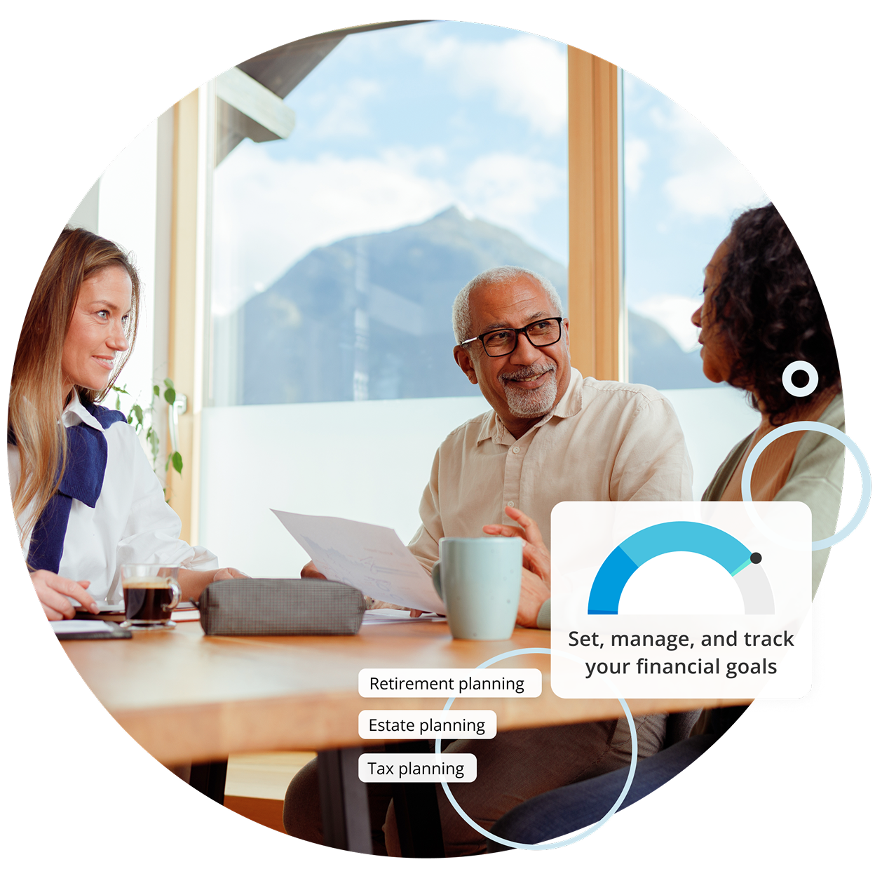 Couple sitting with financial advisor. Set, manage and track your financial goals.